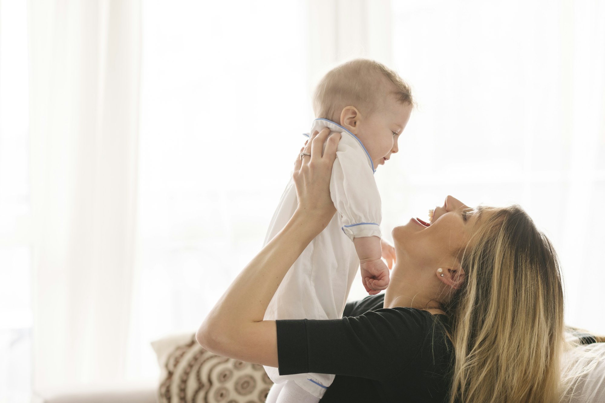 Mother and baby bonding at home